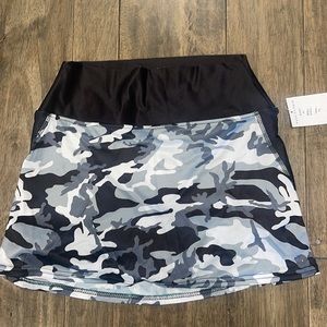 Faye + Florie tennis skirt.  NWT. Size medium.